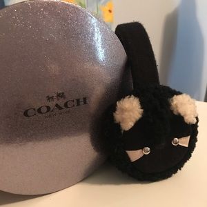 Coach Raccoon earmuffs